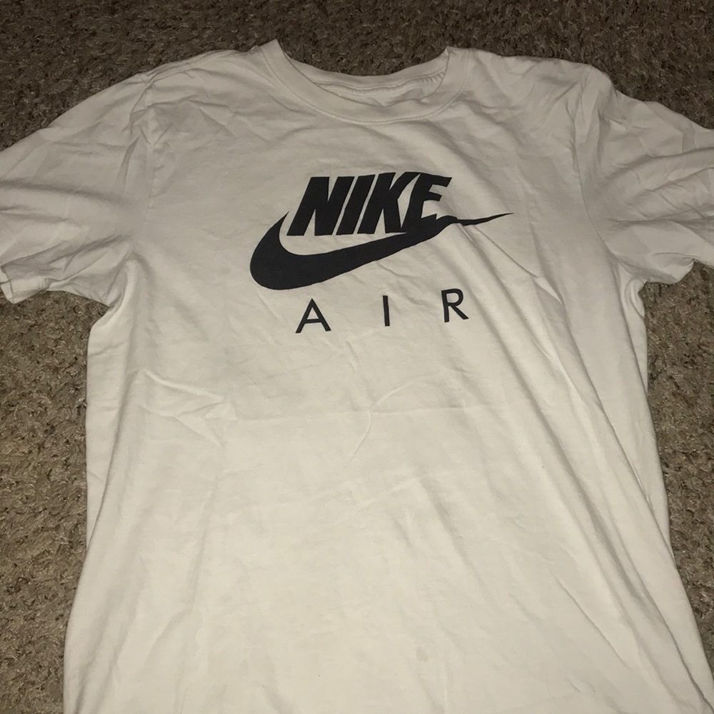 White Nike Shirt , Black Colored Brand Name